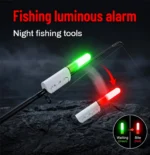 Night fishing rod light mounted near a rod tip with green waiting and red bite indication